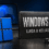 Arte editorial de la actualización anual de Windows llegando al canal de vista previa, con el número de build sobre un fondo oscuro