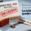 Ilustración: sobre una mesa de fórmica celeste pálido, una tarjeta de cartulina blanca con canto rojo, parada en un atril de madera, dice «Office 2016 · 2019» y «Pago único», y tiene estampado en diagonal un sello rojo que dice «Sin licencia». Delante, un sello de goma tumbado y una llave de bronce con una etiqueta que dice «Tu clave». A la derecha, el logo de Microsoft, el antetítulo «Según Microsoft · KB5002907» y el titular «La actualización quedó en pausa».