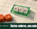 Ilustración: sobre una hoja de papel contable crema con cuadrícula verde, una sola celda se levanta convertida en una caja de acrílico verde con canto visible y guarda de pie tres fichas con los nombres «Ana», «Luis» y «Sofía»; las celdas de al lado siguen vacías. Abajo a la izquierda, dos teclas naranjas sueltas dicen «Ctrl» y «J». En una franja verde oscuro, el logo de Excel, el texto «Excel · Canal Beta» y el titular «Varios valores, una sola celda».